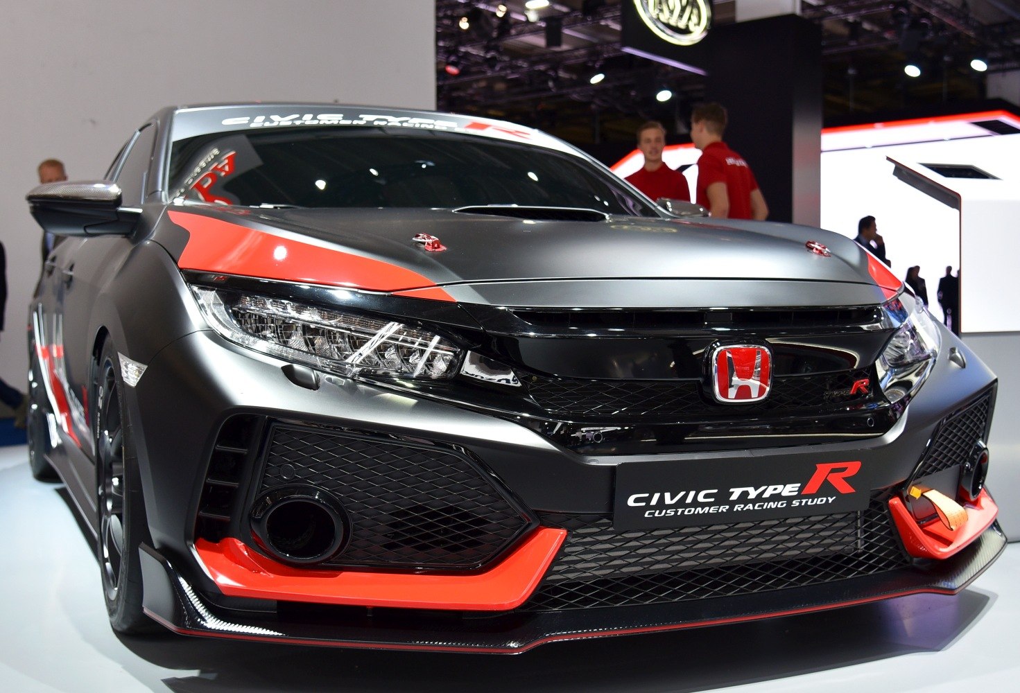 Aggressive front fascia with racing styling and detailed headlights