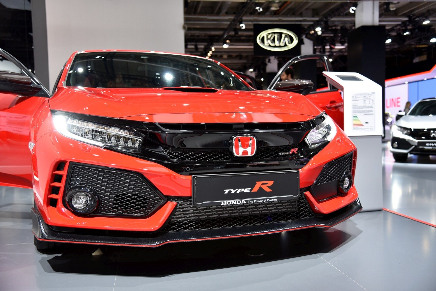 Aggressive front fascia with distinctive grille and headlights