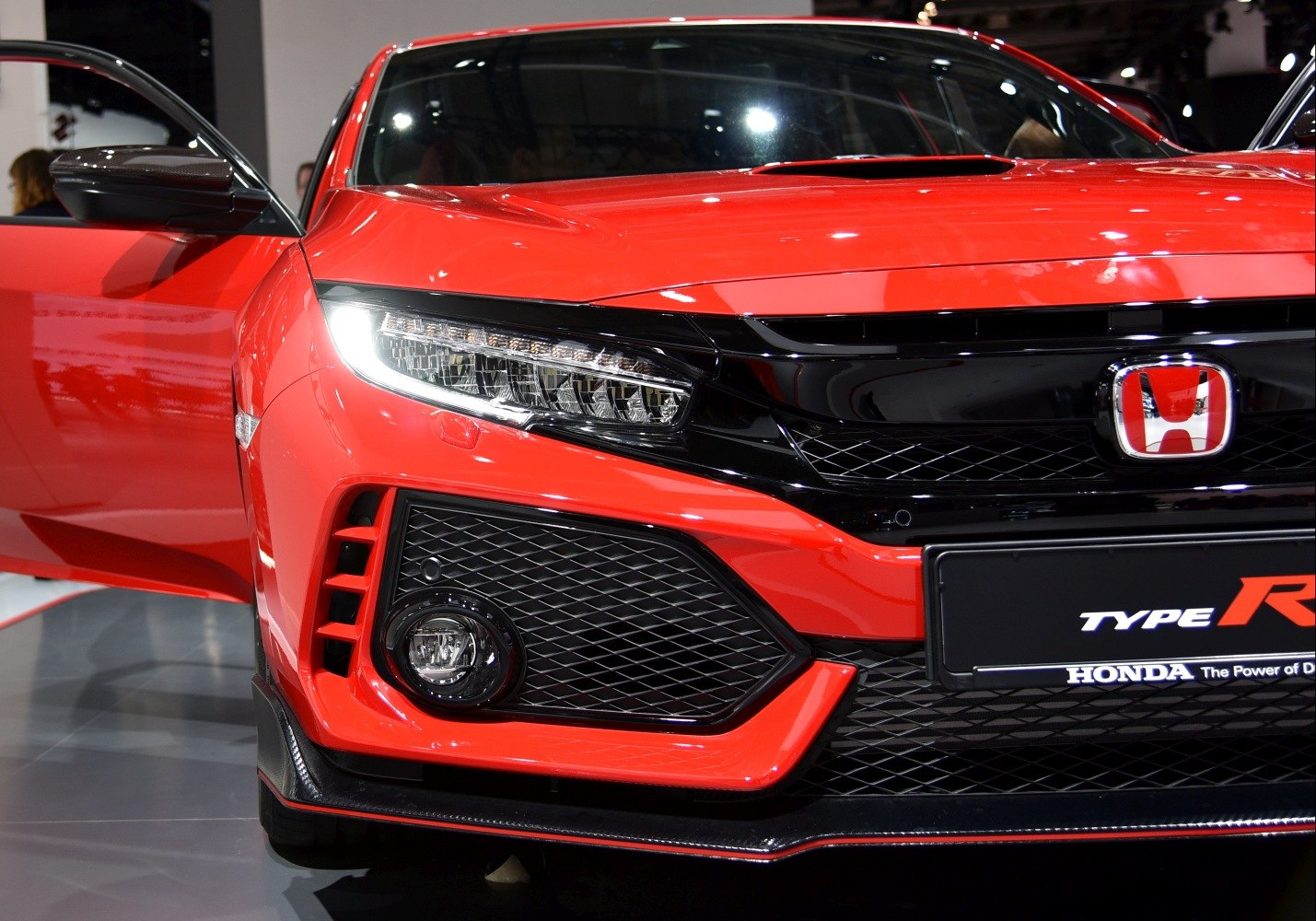 Close-up of aggressive front fascia showing LED headlights and grille