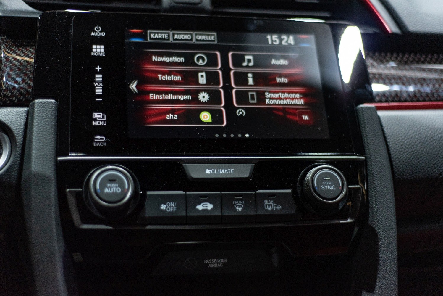 Infotainment touchscreen and automatic climate control knobs