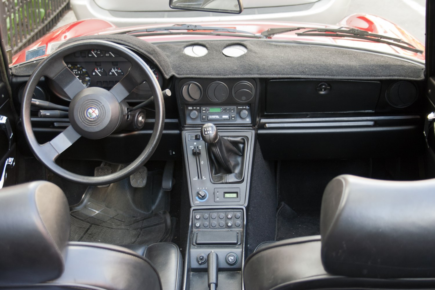 Vintage car interior with manual gear shift and classic dashboard