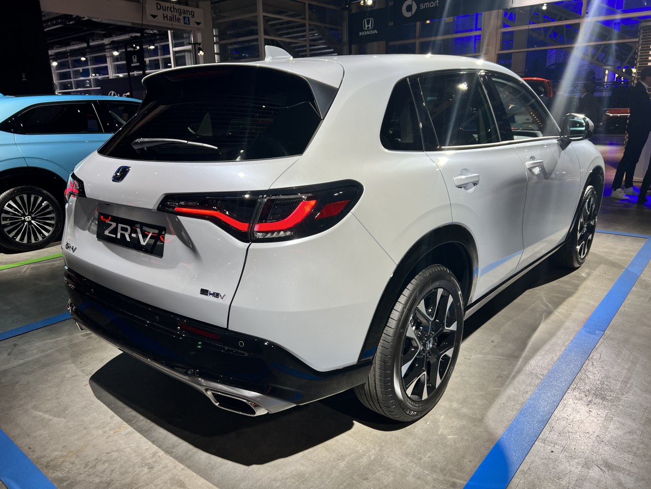 LED taillights, dual exhaust tips, rear design, alloy wheels