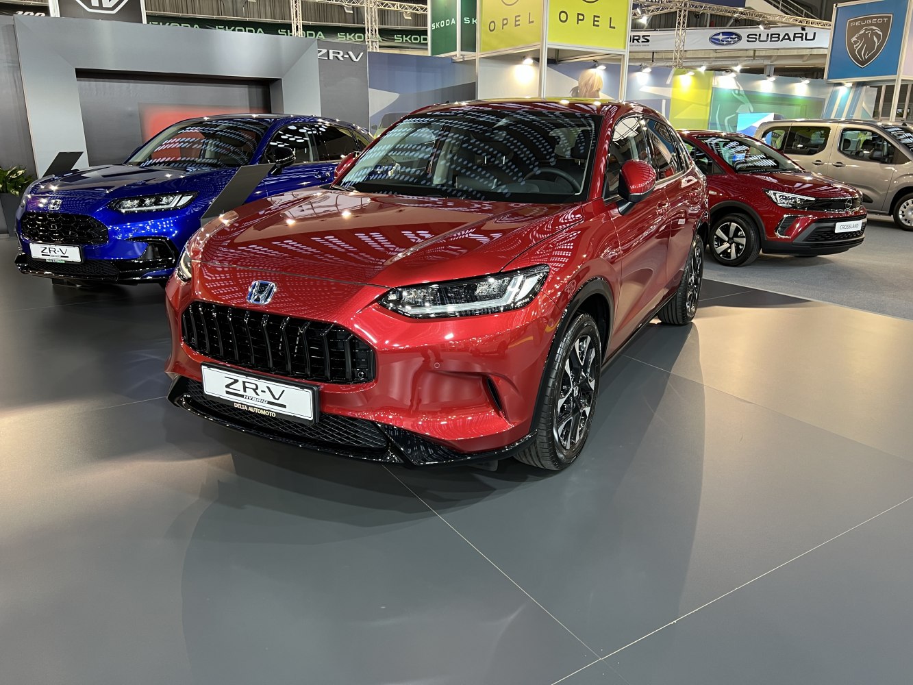 Aggressive black grille and sleek LED headlights on a modern SUV front.