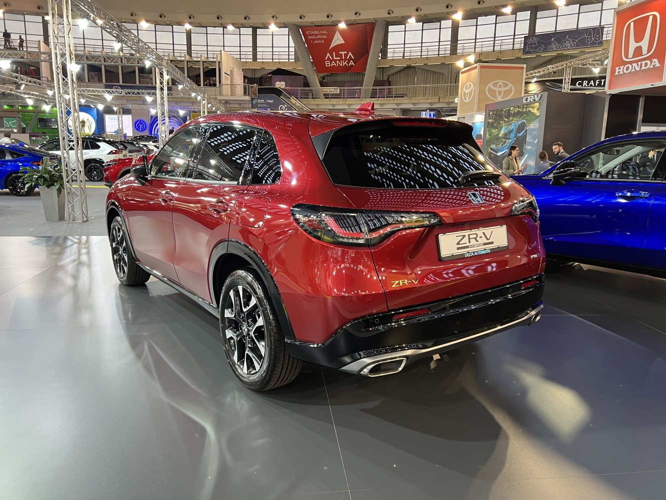 Rear view of a hybrid SUV with sleek taillights and dual exhaust tips