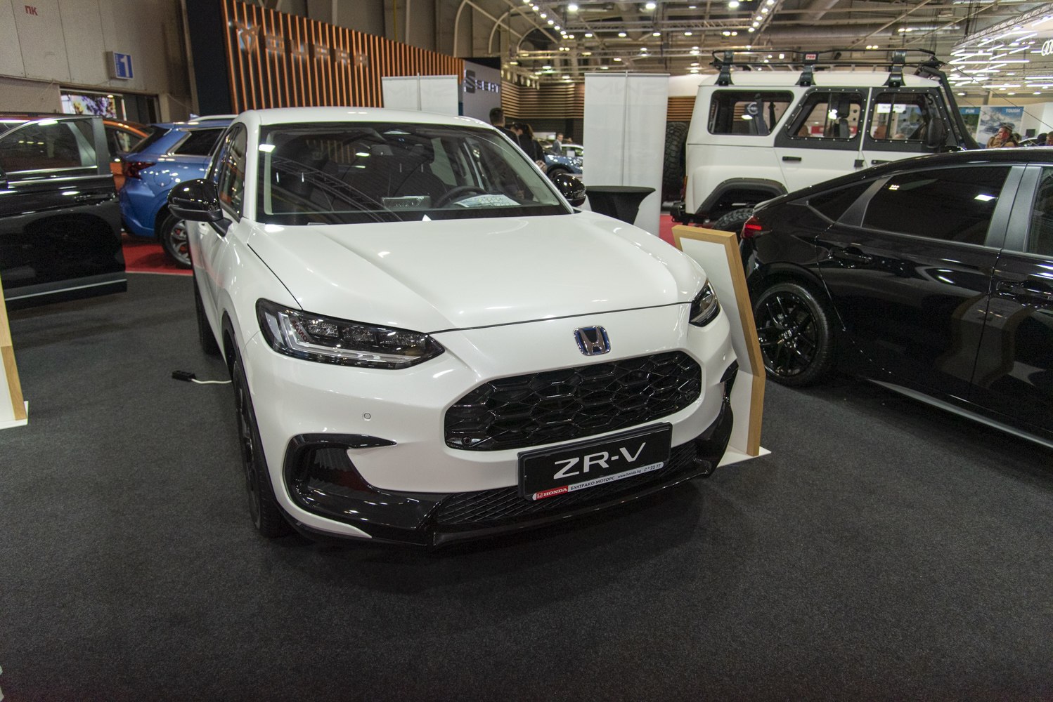 Front view with honeycomb grille and LED headlights