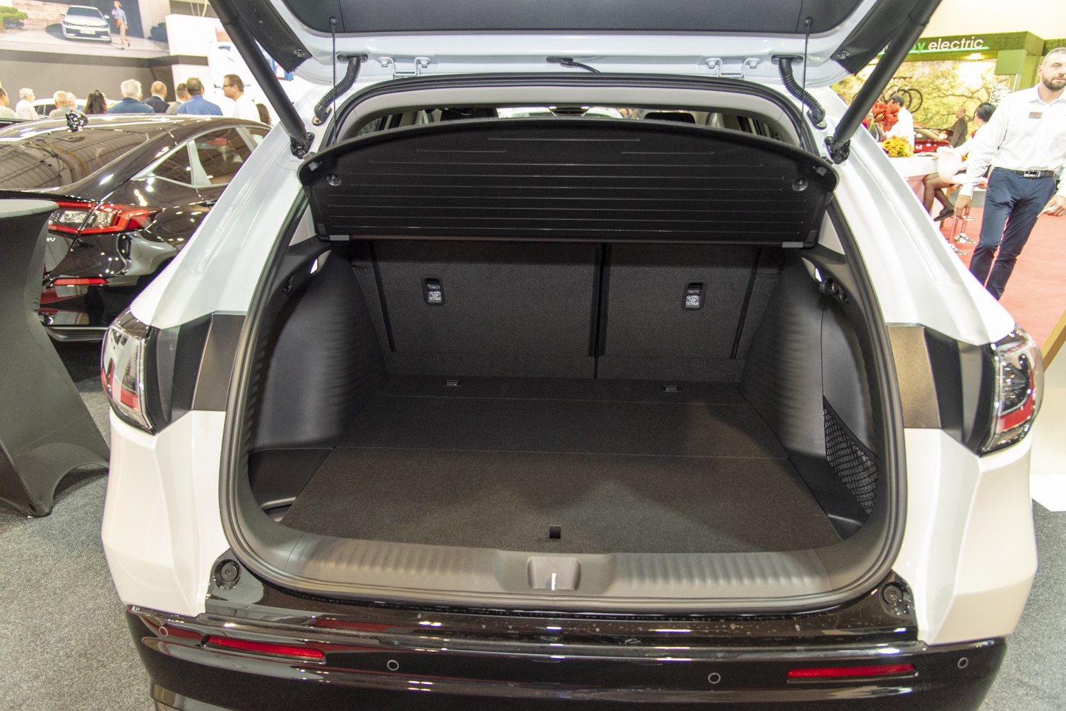Open rear cargo area with privacy cover and spacious trunk space