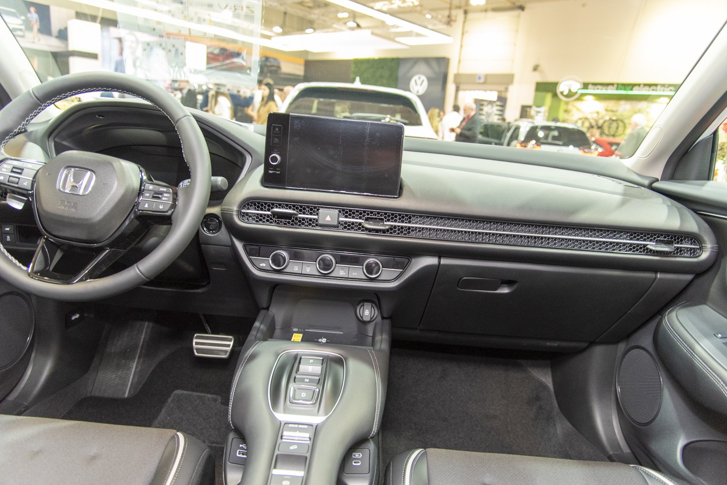 Modern dashboard layout with steering wheel and digital display