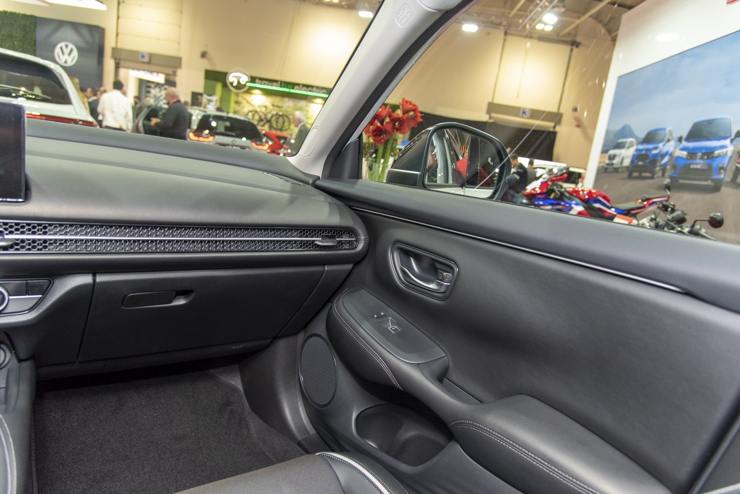 Interior door panel and dashboard with modern controls and trim