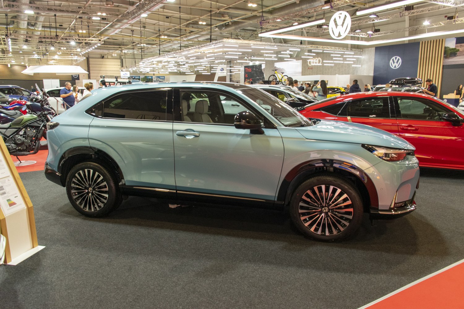 Side profile of a modern compact SUV with multi-spoke alloy wheels