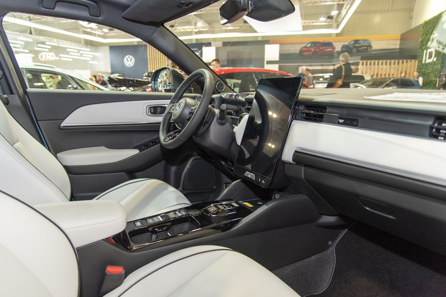 Modern car interior with large touchscreen and minimalist dashboard
