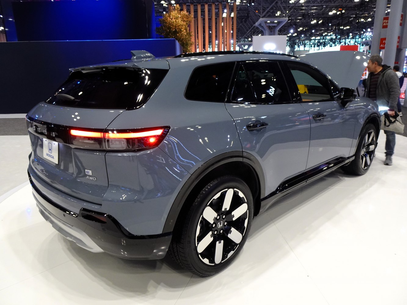 Sleek rear and side view with distinctive taillights and AWD badging