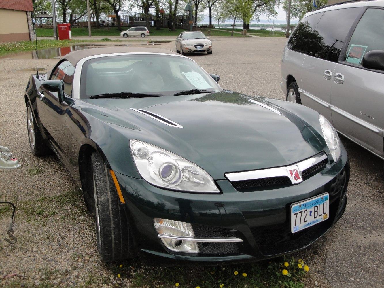 Convertible front view with headlights and soft top