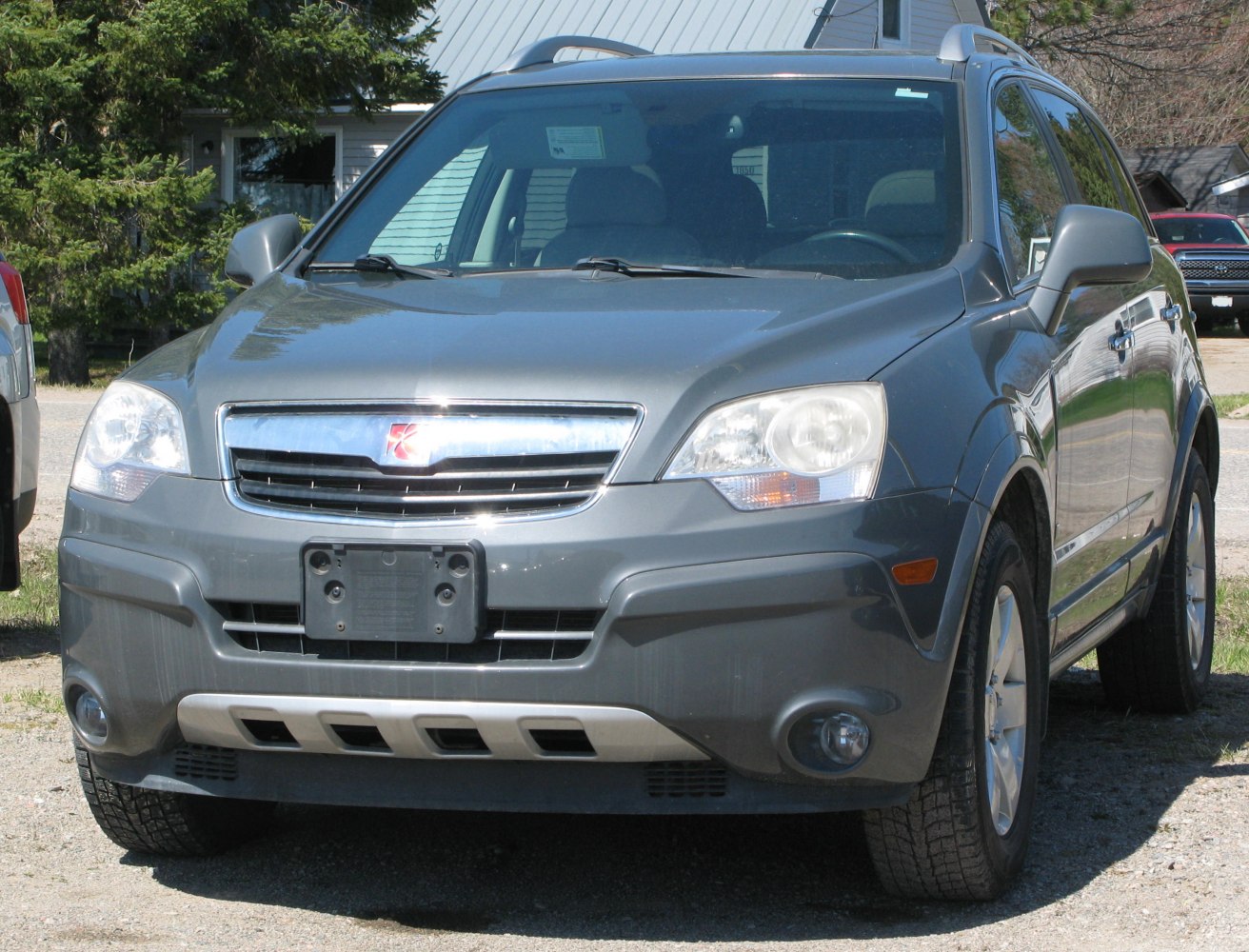 Front view of compact SUV featuring grille and headlights