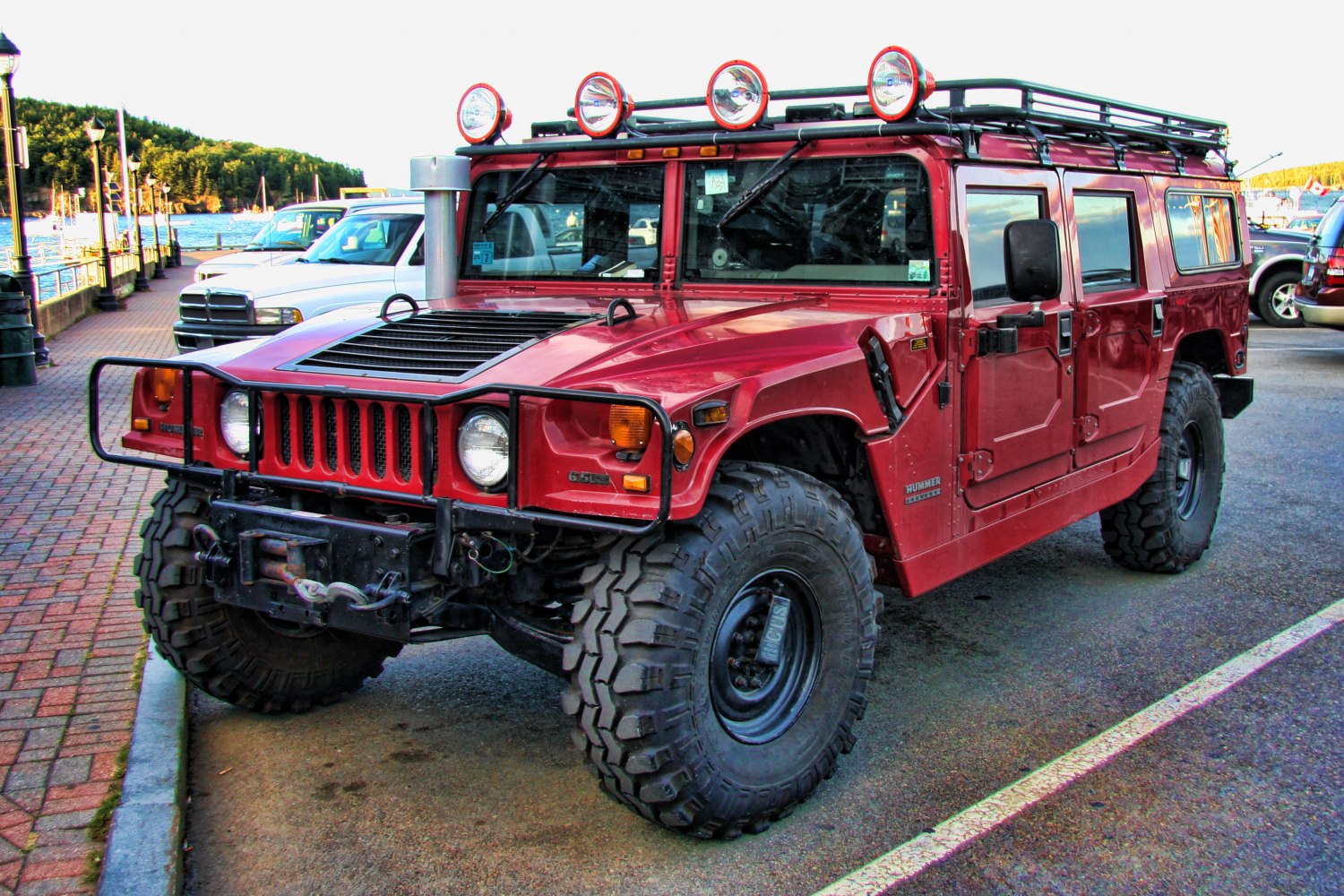 Robust off-road vehicle with roof spotlights and snorkel