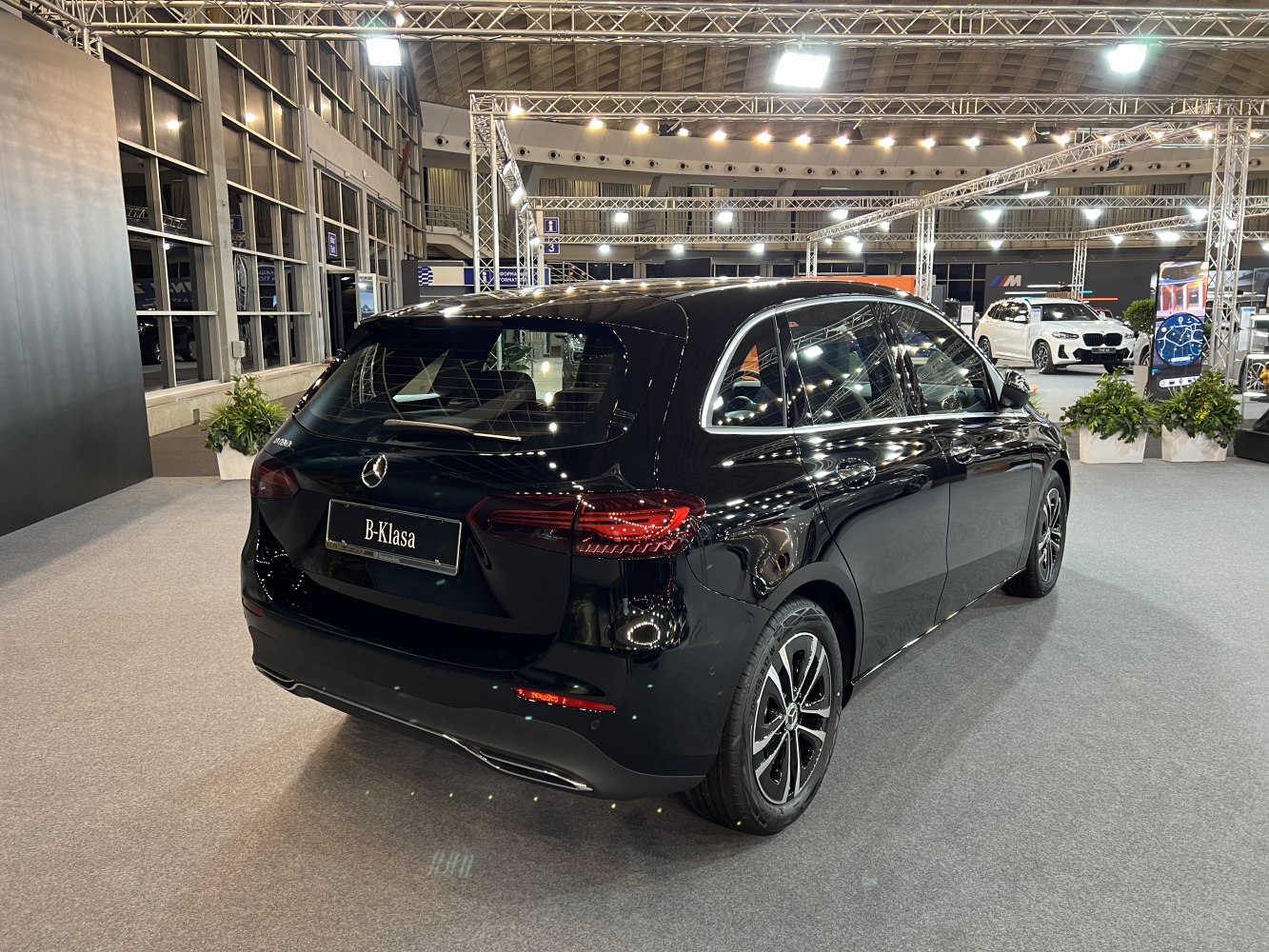 Rear and side profile with sleek taillights and black finish