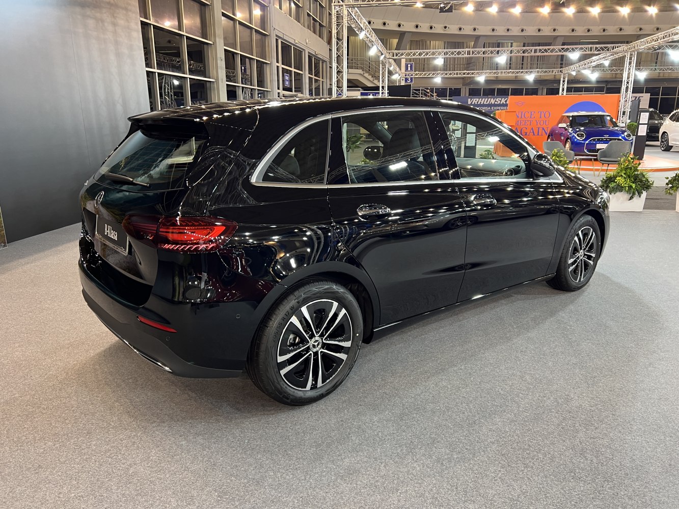 Rear-side view showing sleek rear lights and alloy wheels