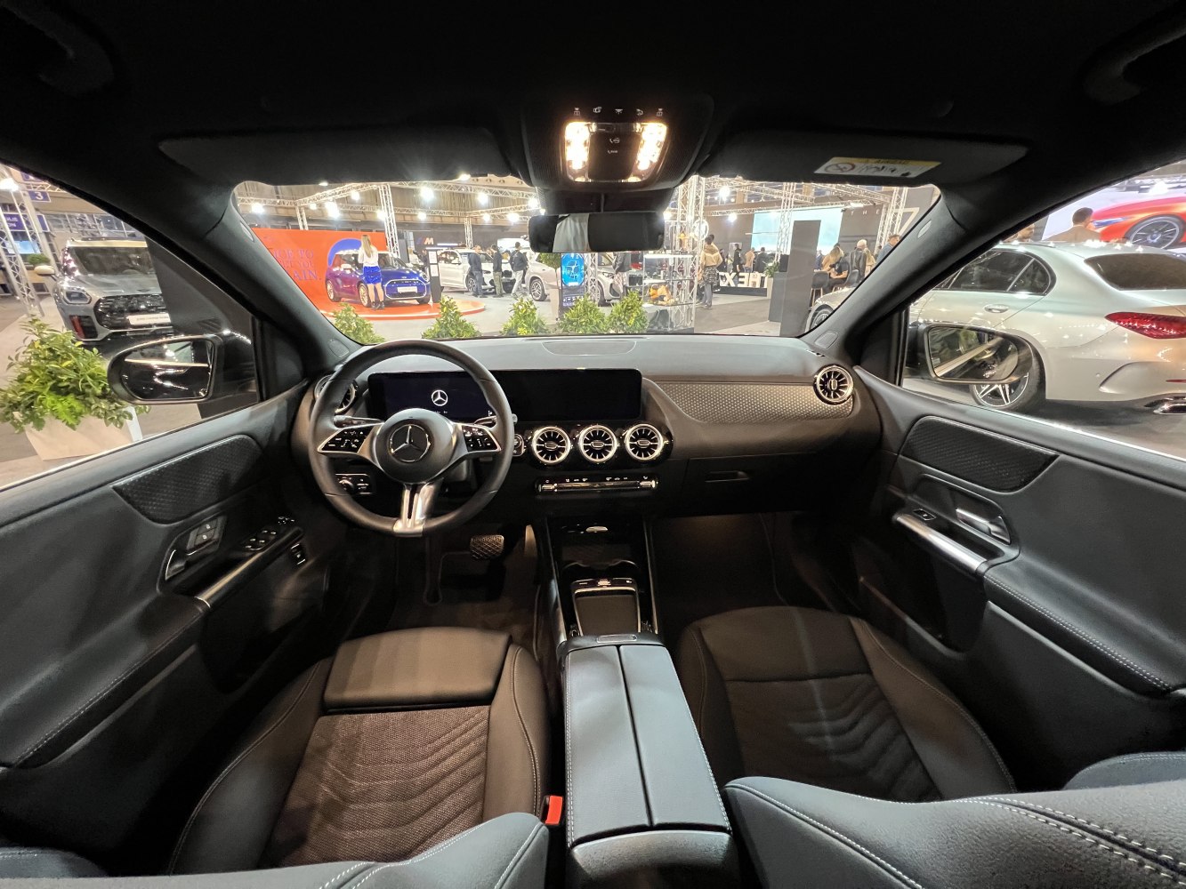 Digital dashboard and modern steering wheel in premium car interior