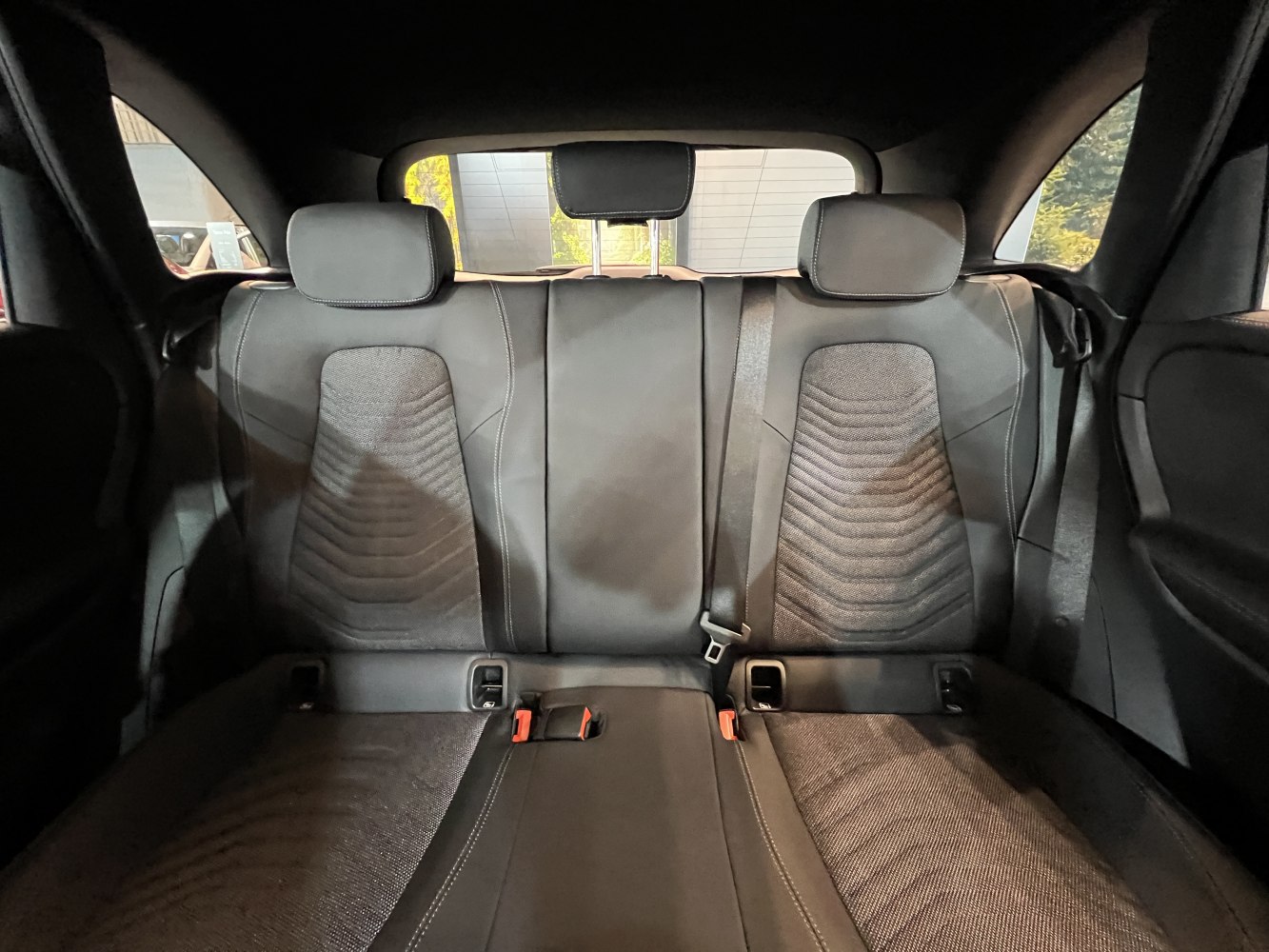 Rear seat interior with headrests and seatbelt