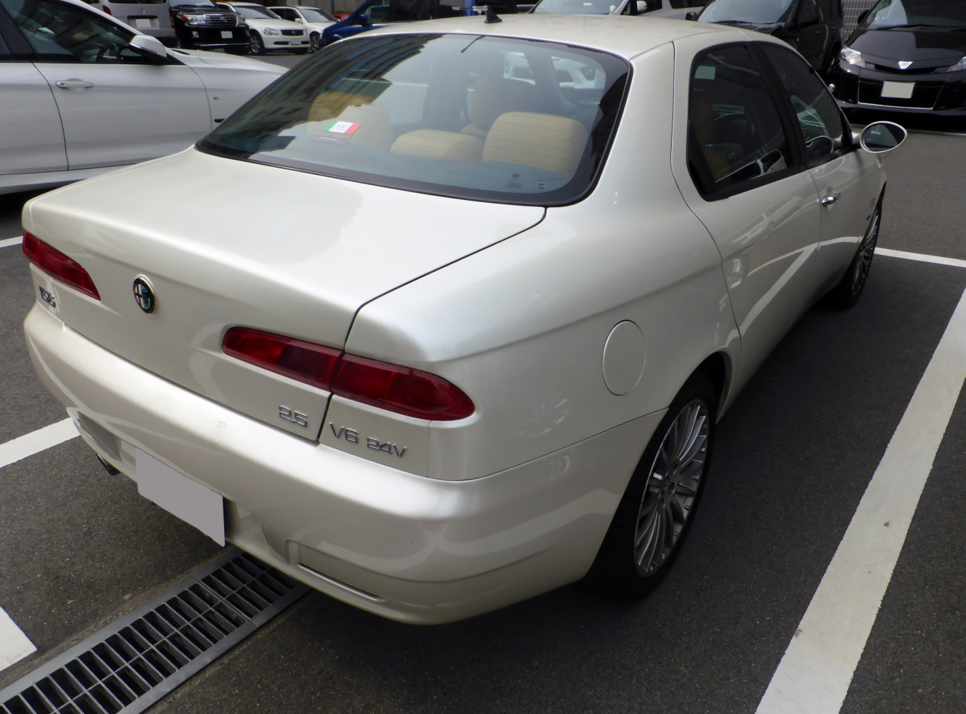 Car rear and side profile with taillights and smooth body lines