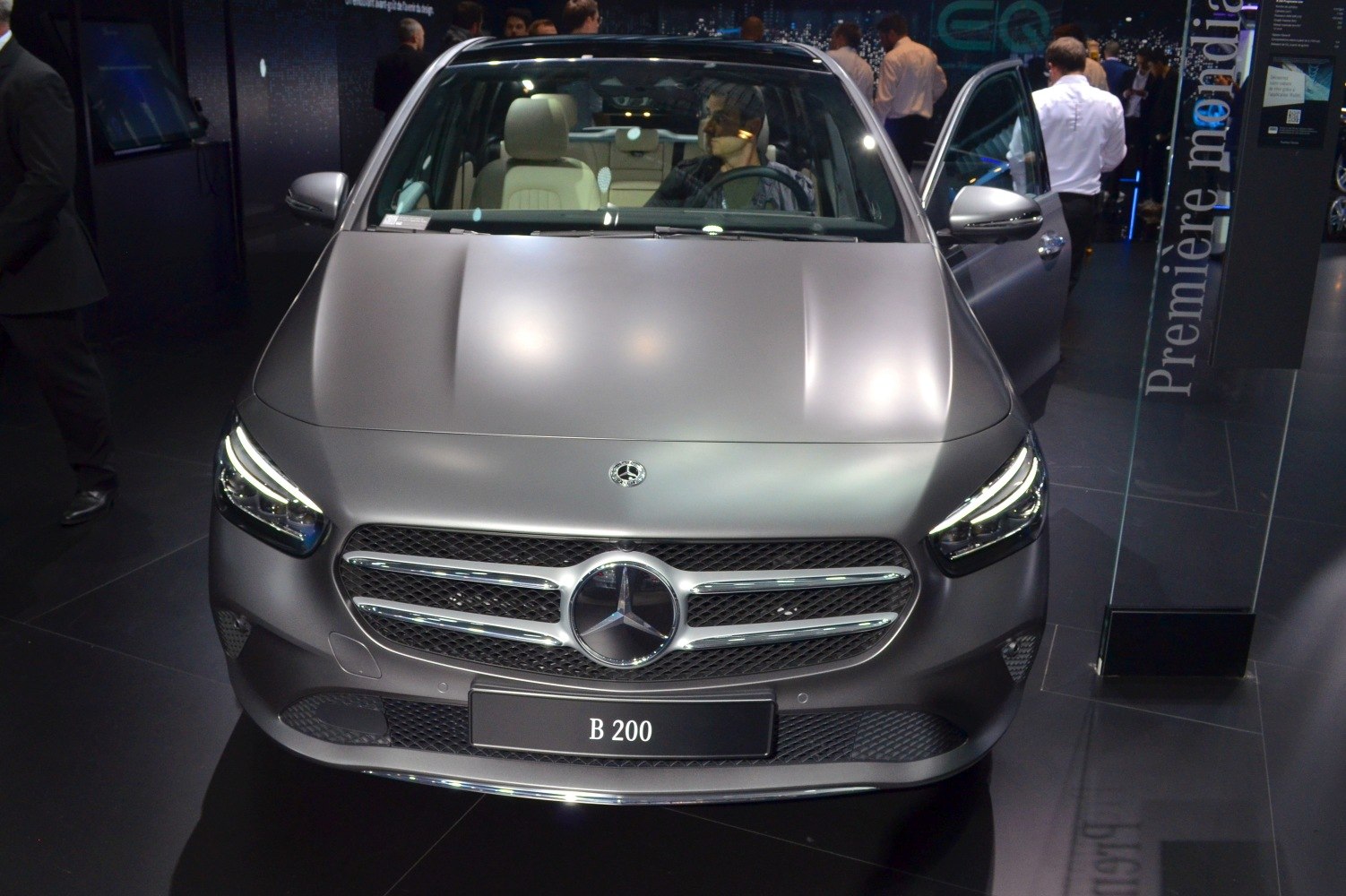 Front grille and LED headlights of a modern compact luxury vehicle