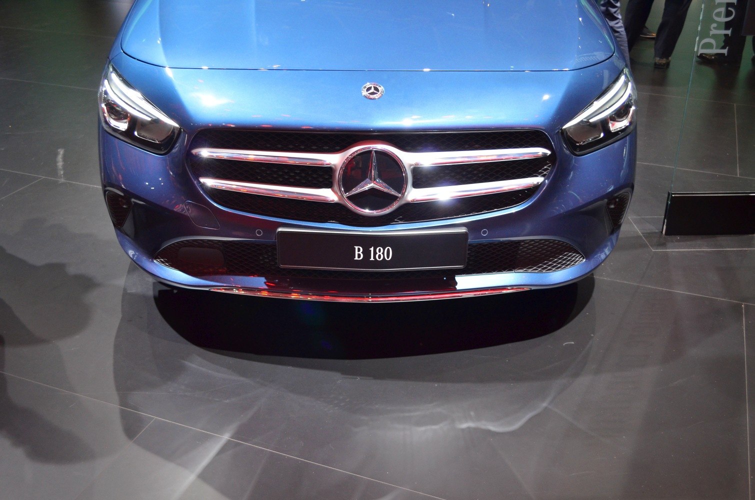Close-up of front grille and LED headlights