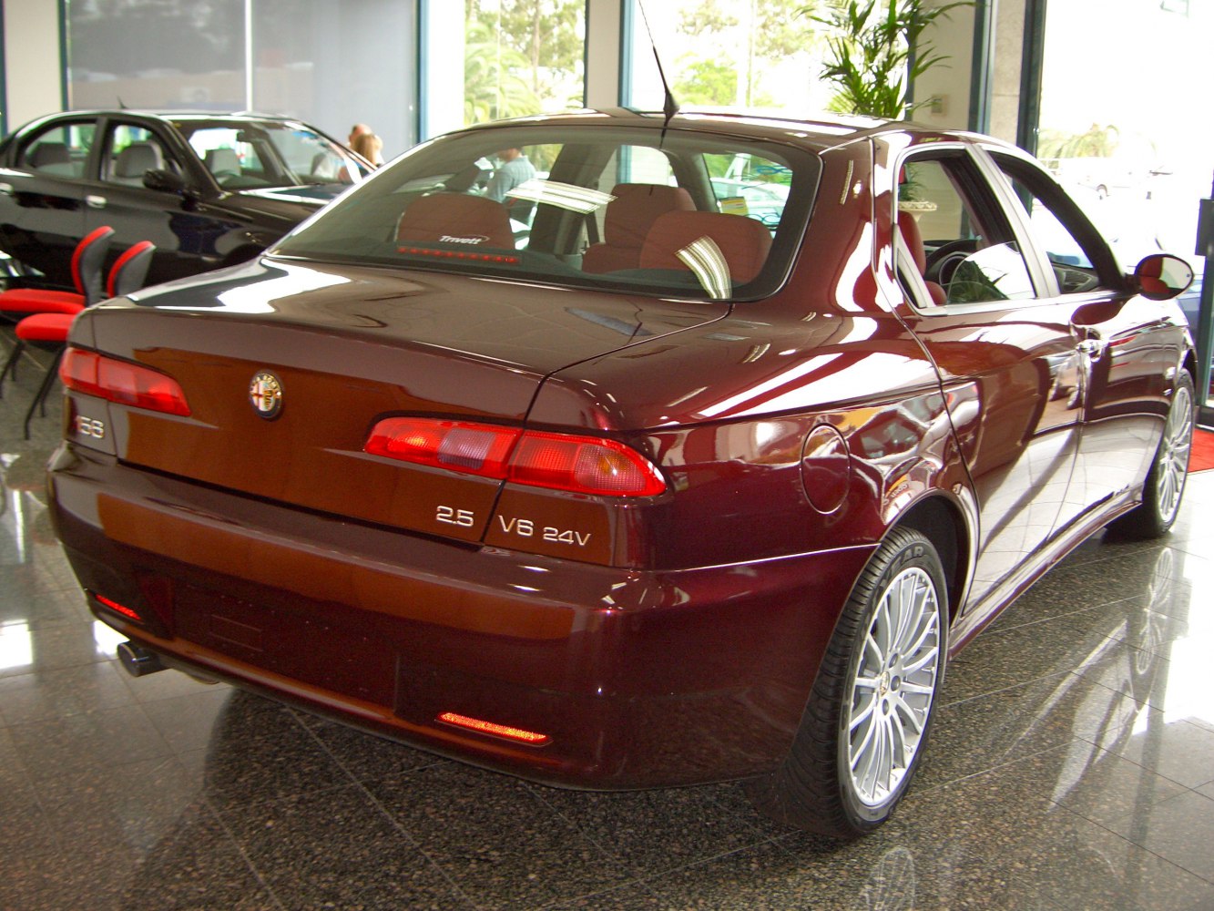 Rear view with taillights and alloy wheels