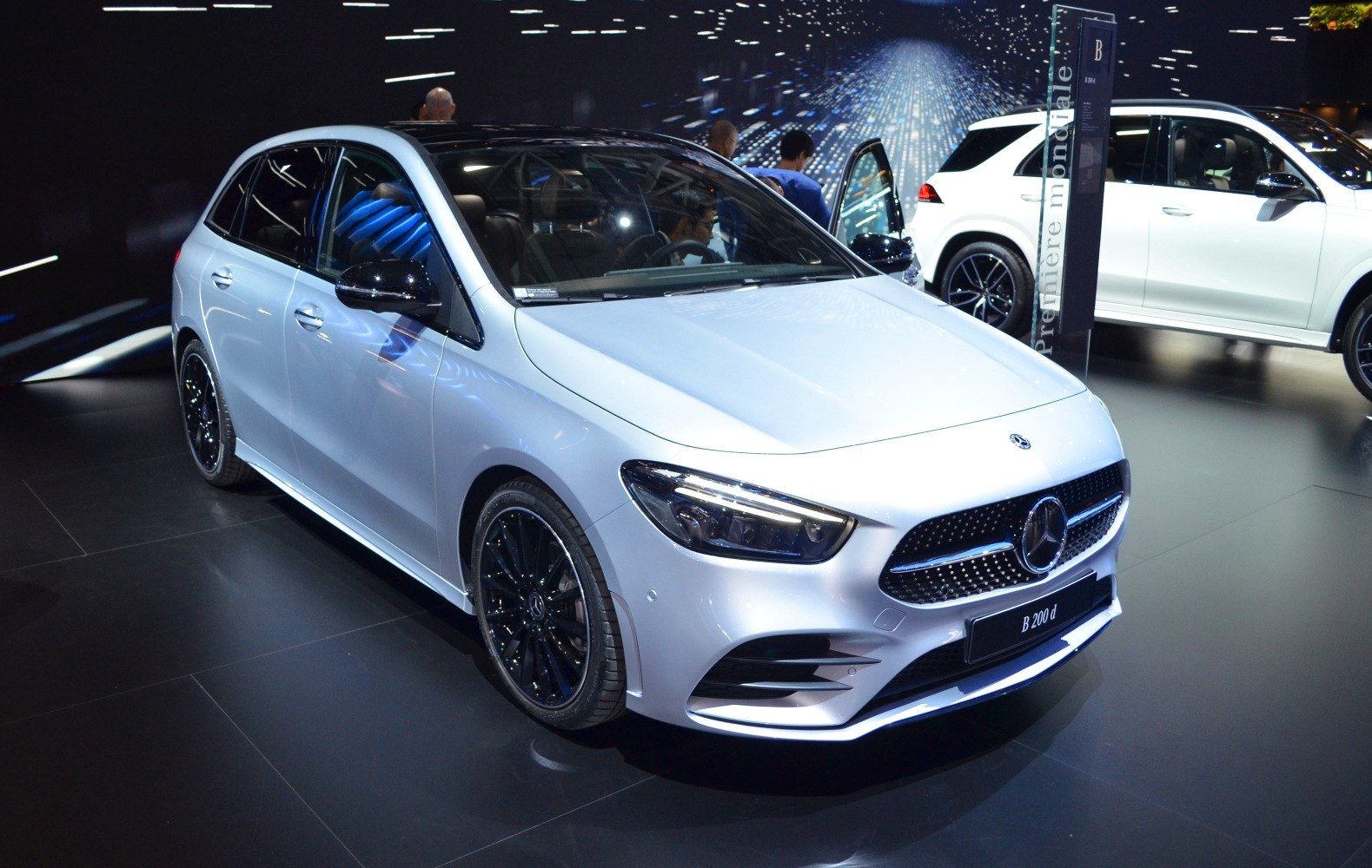 Front and side view with LED headlights and alloy wheels