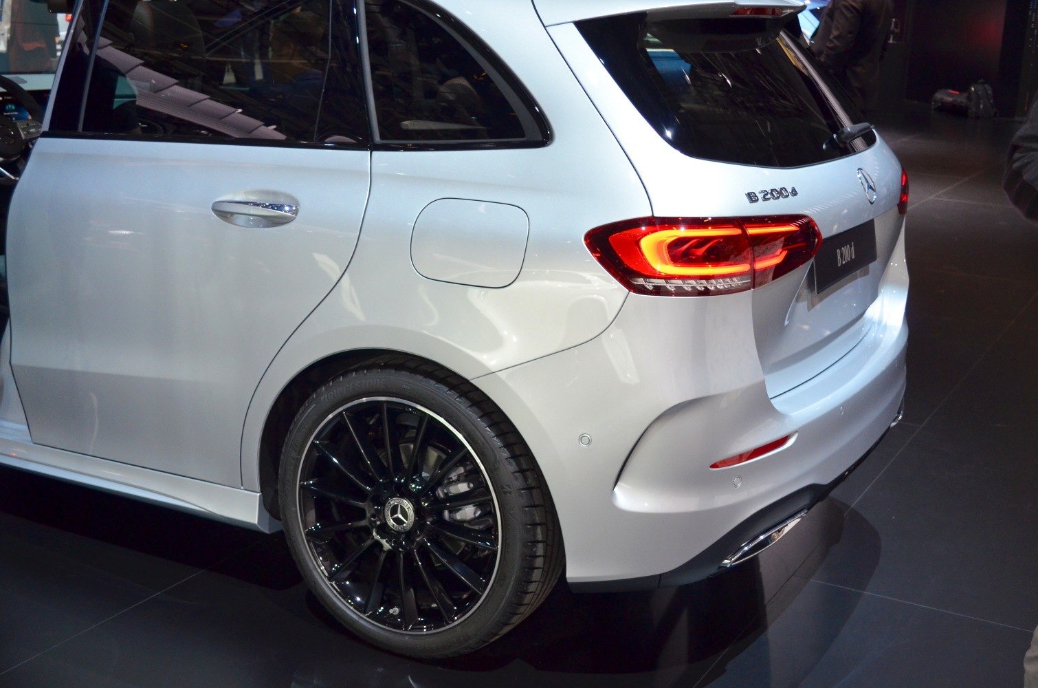 Rear side hatchback with LED taillights and black multi-spoke alloy wheels