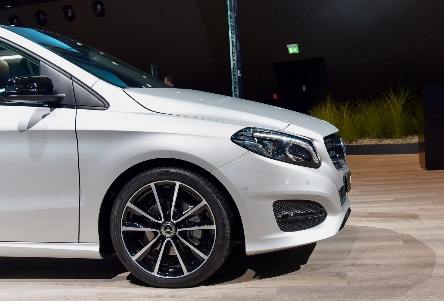 Front side view with alloy wheel and distinctive headlight design