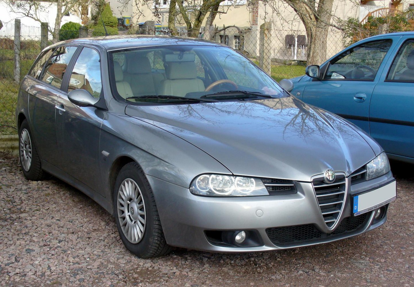 Front view with triangular grille and sleek headlights