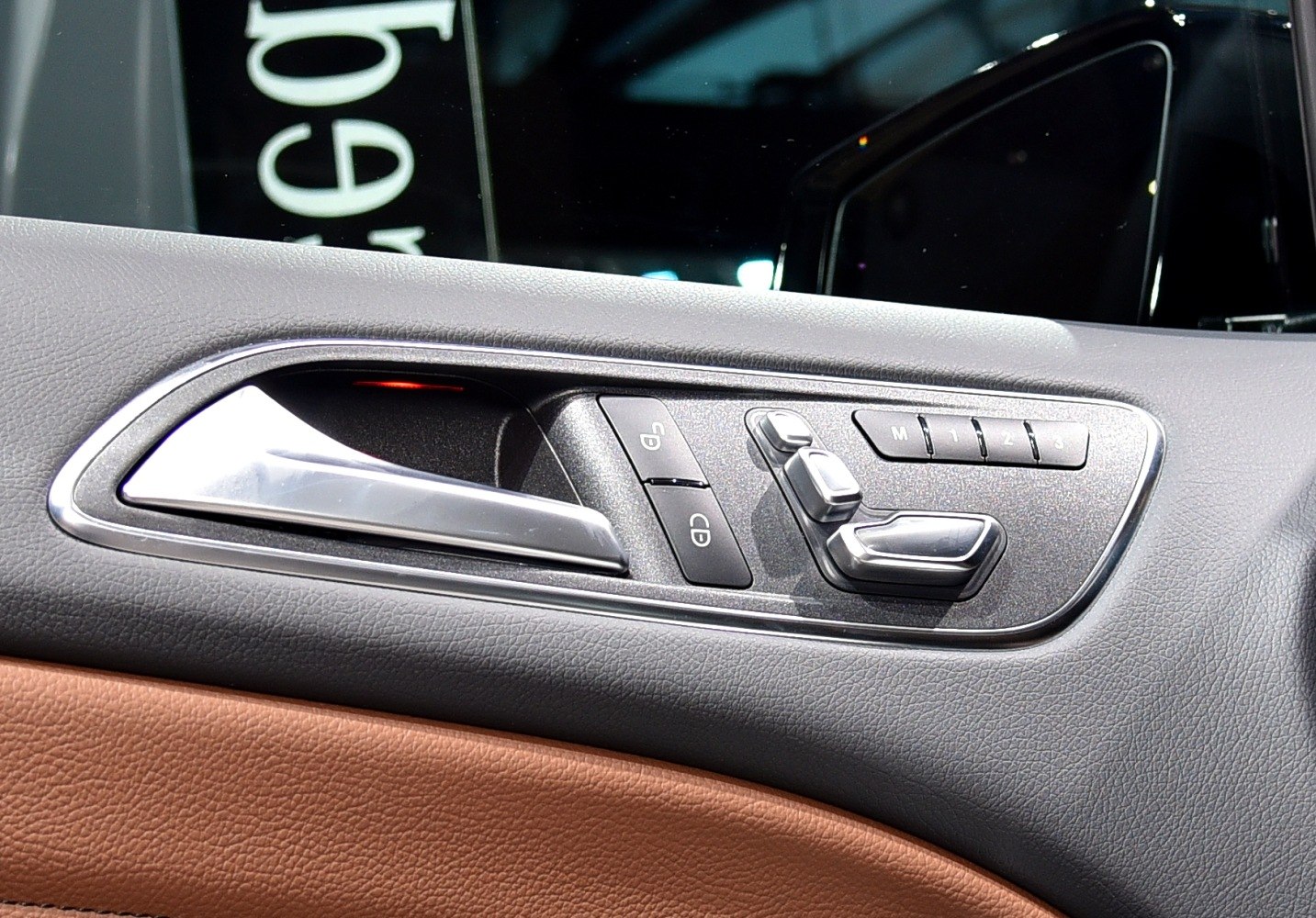 Car door panel with seat adjustment and lock controls