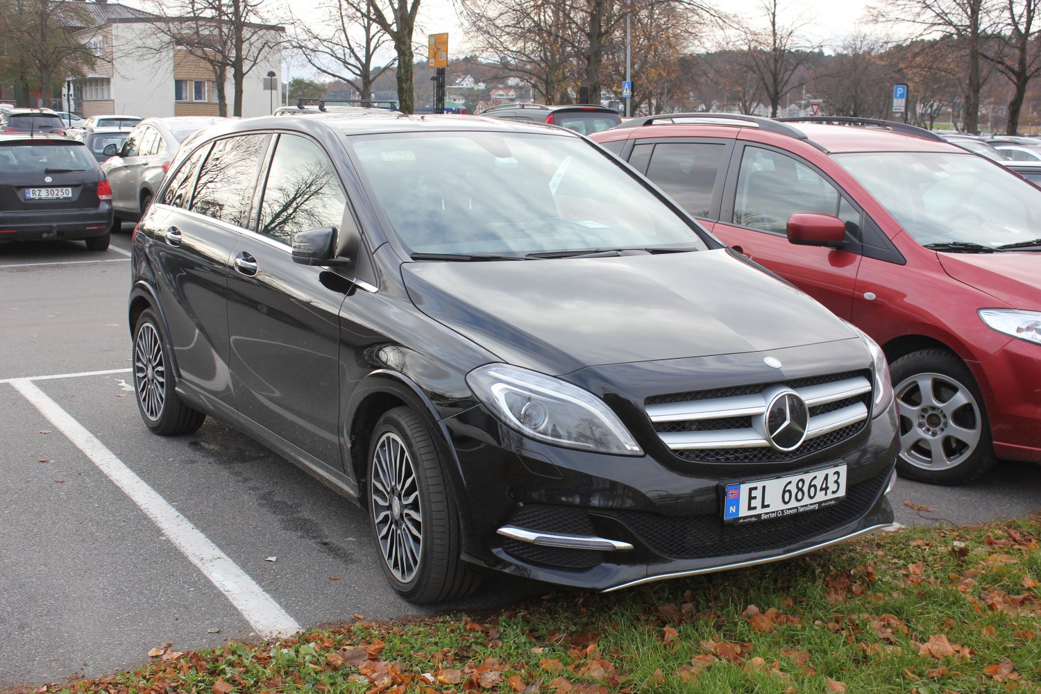 Front and side view with LED headlights and alloy wheels