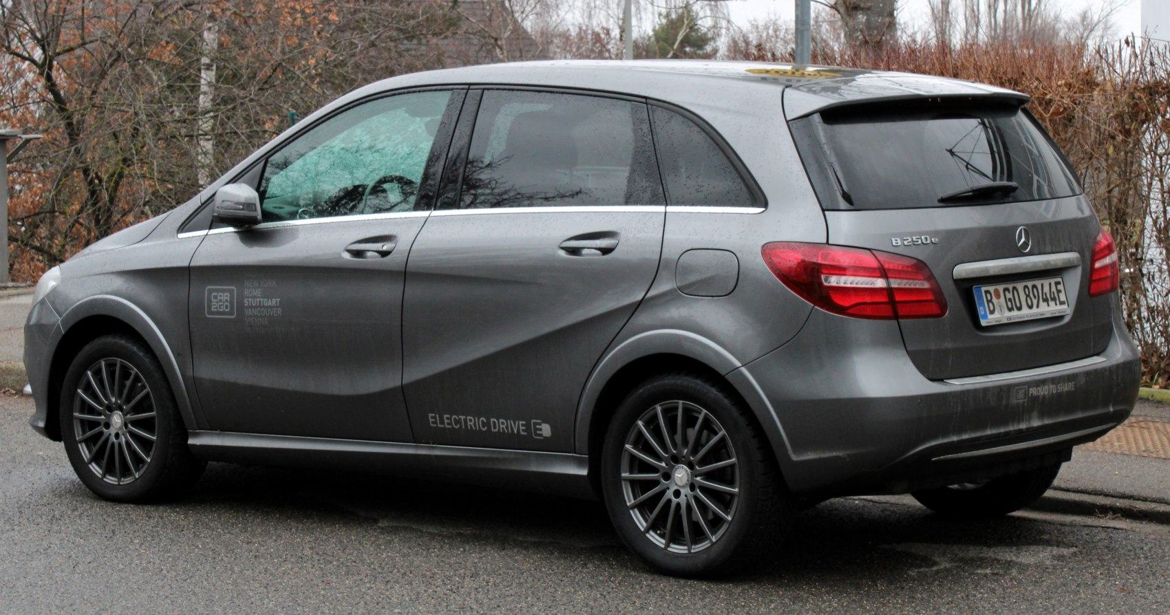 Rear side view of an electric hatchback with alloy wheels and modern tail lights
