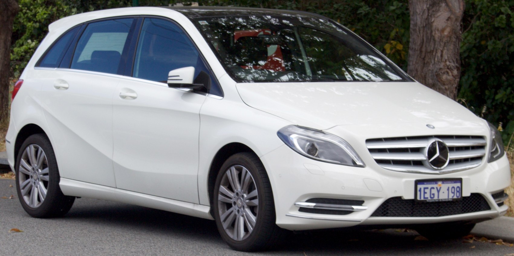 White compact hatchback with LED headlights and alloy wheels