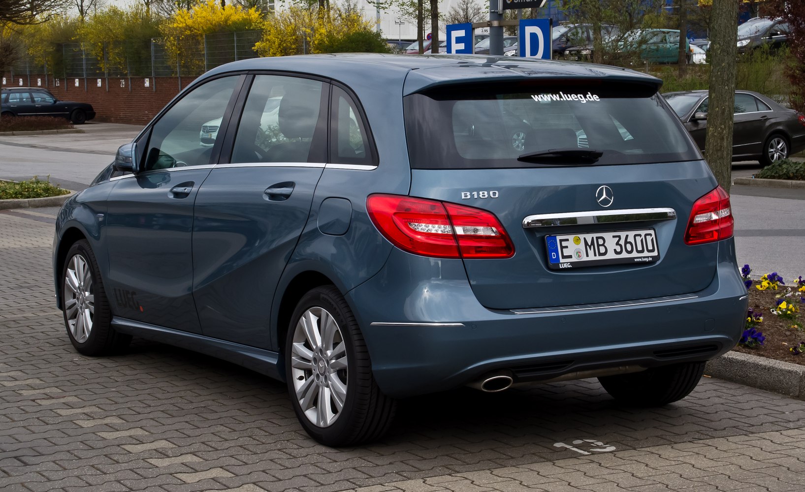 Rear hatchback view with LED taillights and alloy wheels