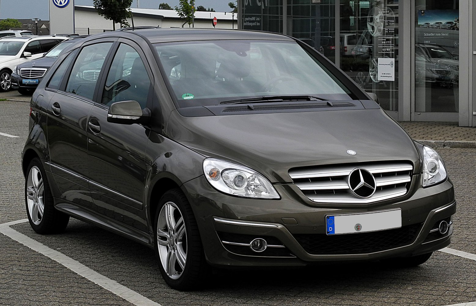 Front-side view of a 5-door hatchback with alloy wheels and sleek headlights