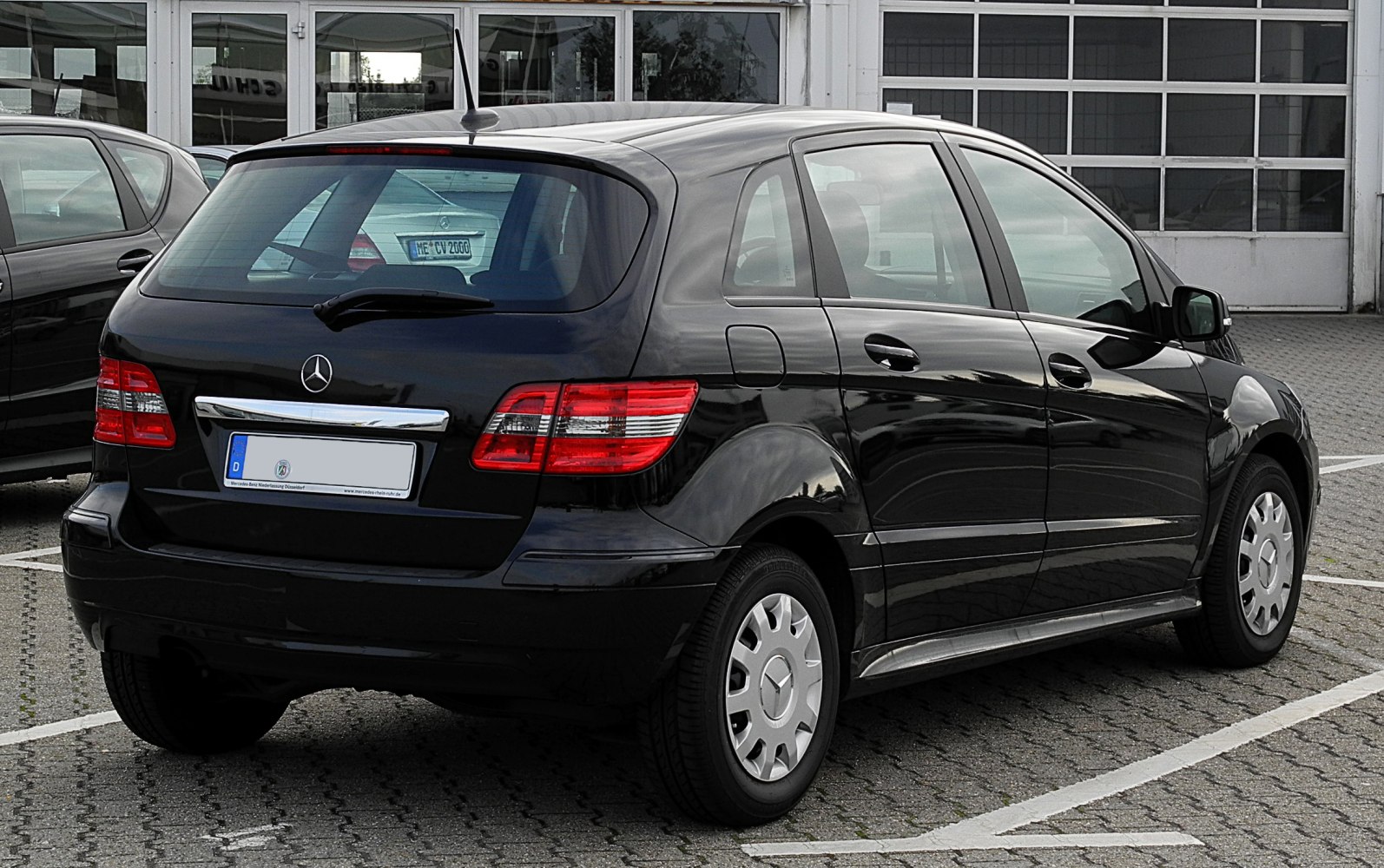 Rear view of compact hatchback with distinct taillights and black finish