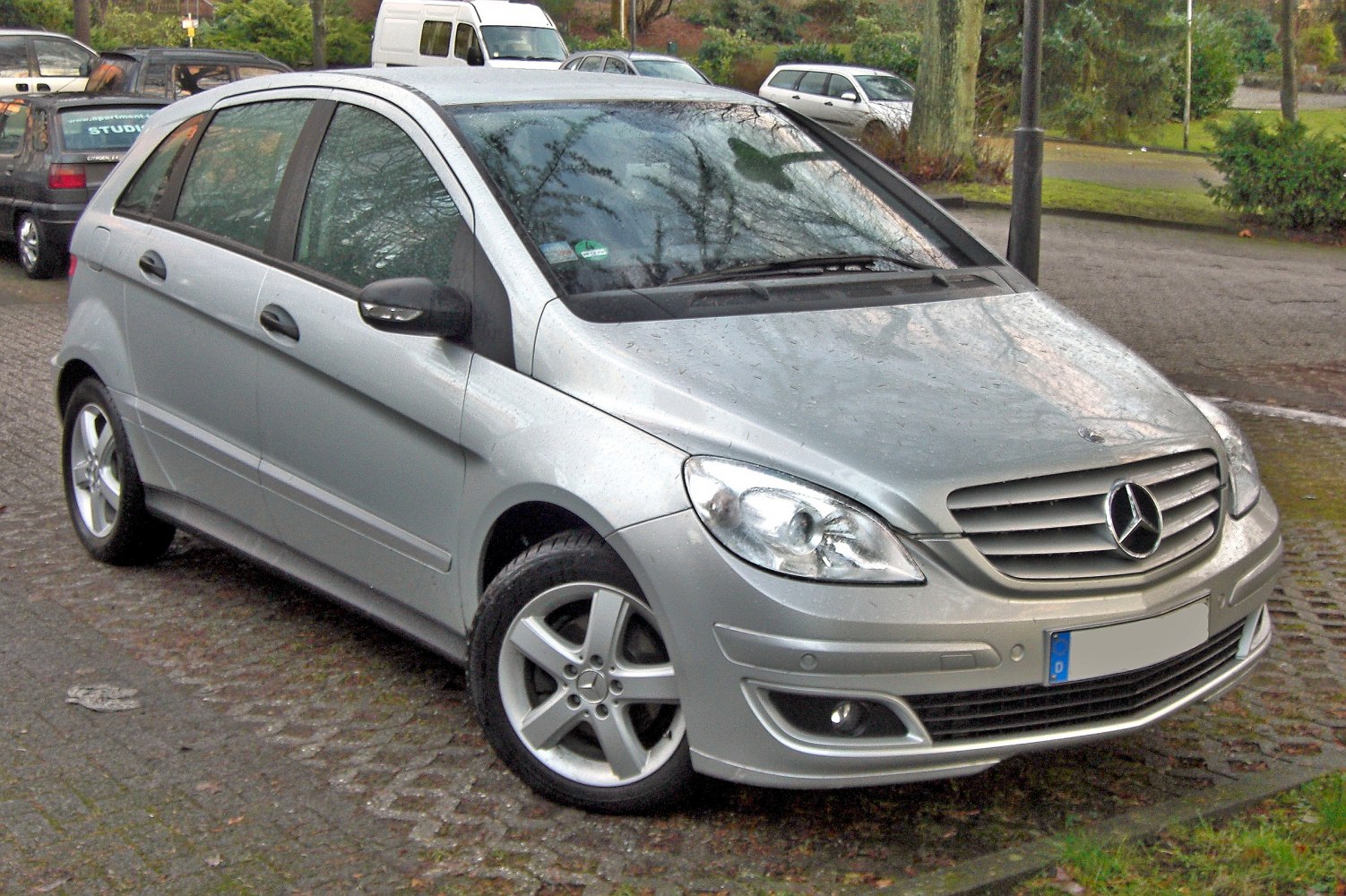 Silver hatchback with alloy wheels and distinctive headlamps