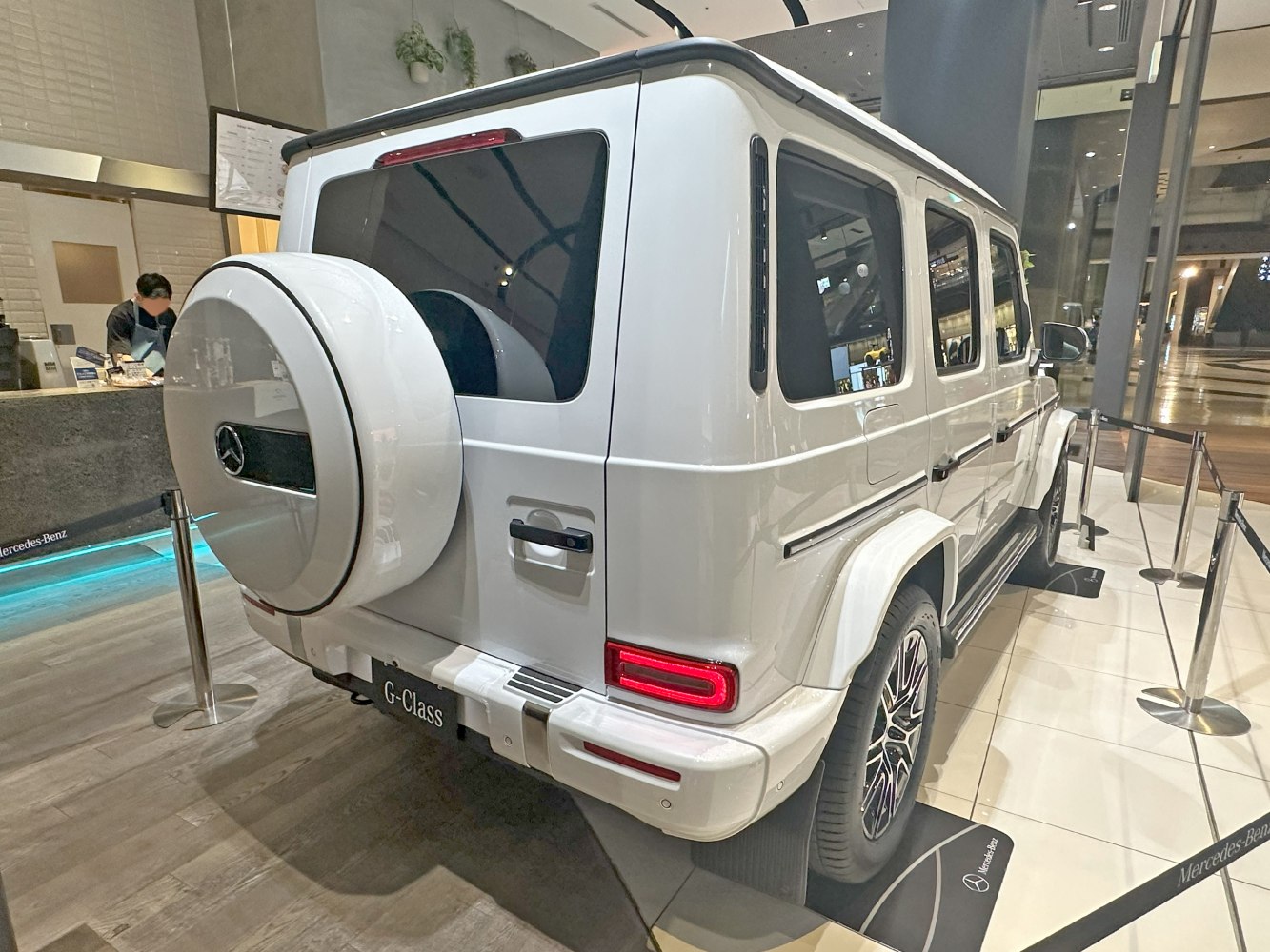 Rear view of SUV with spare tire cover and modern tail lights