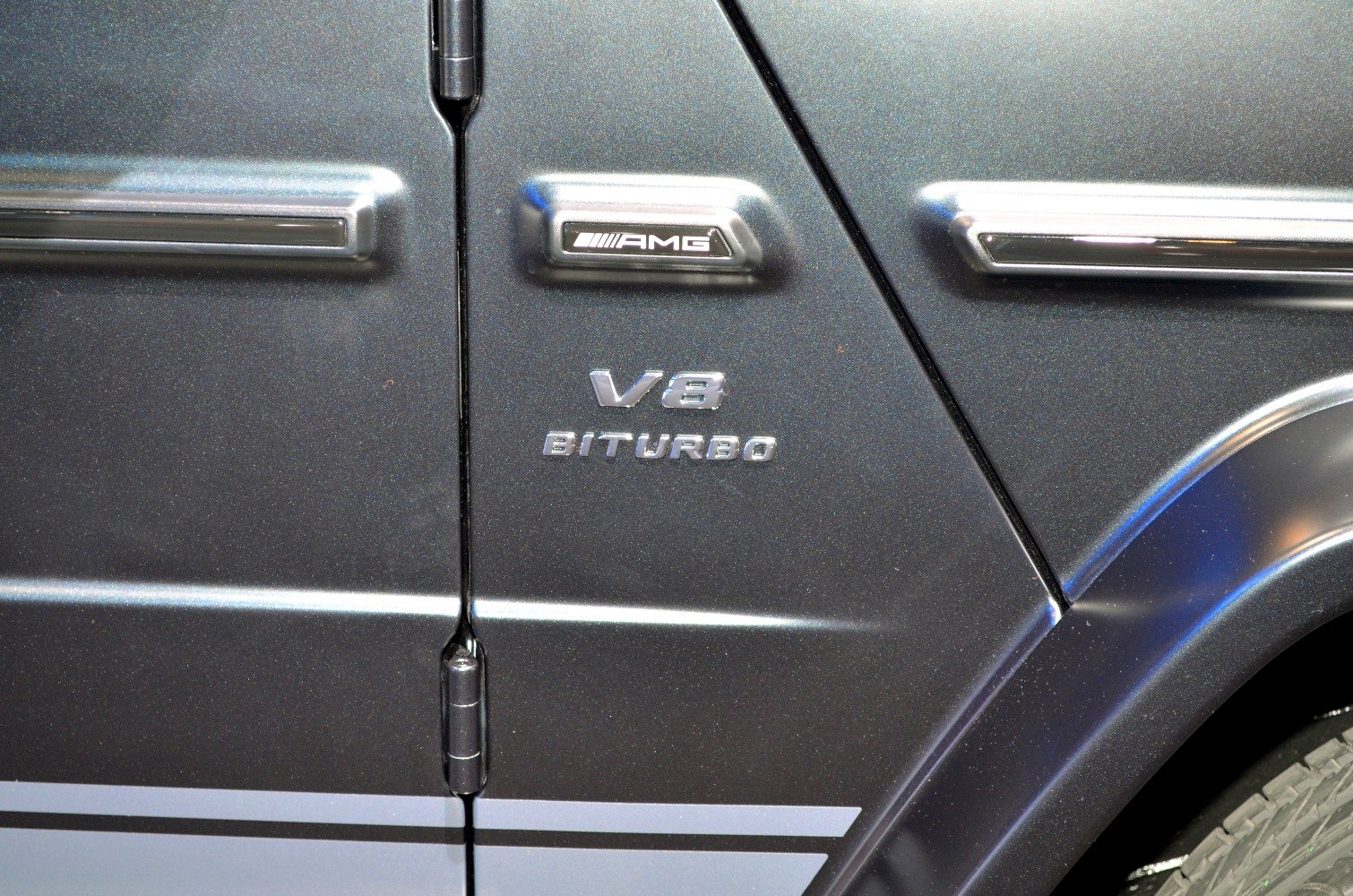 Close-up of AMG V8 BiTurbo badge and side door details
