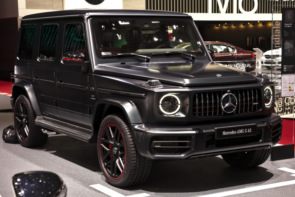 SUV with round LED headlights and black alloy wheels with red highlights