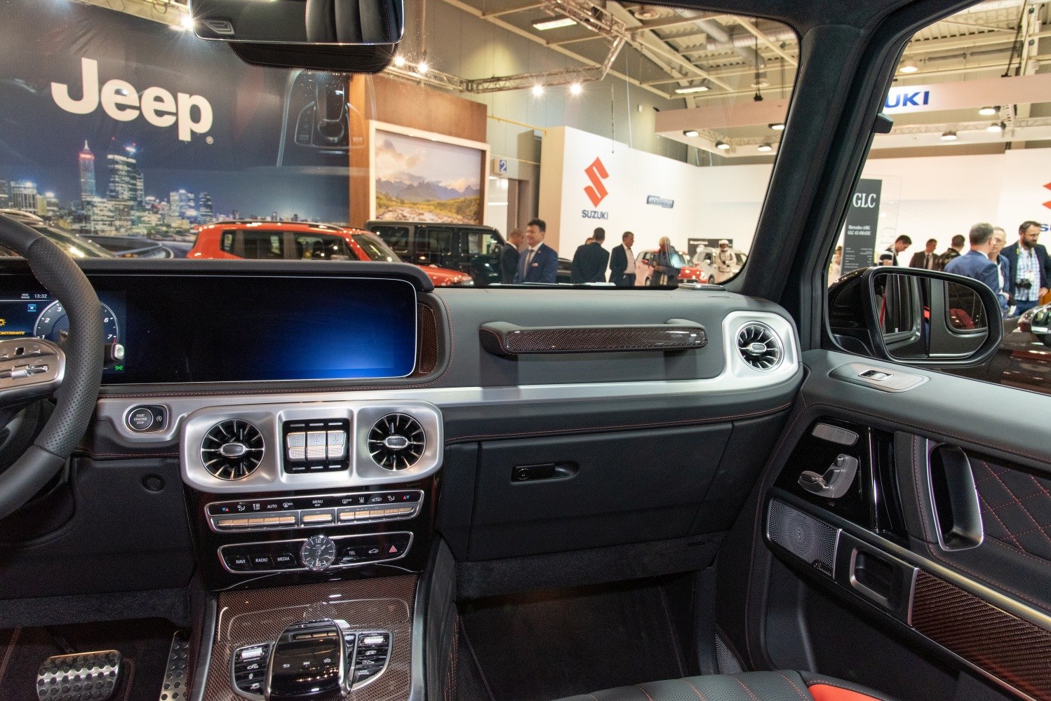 Luxury SUV interior with digital display and advanced dashboard controls