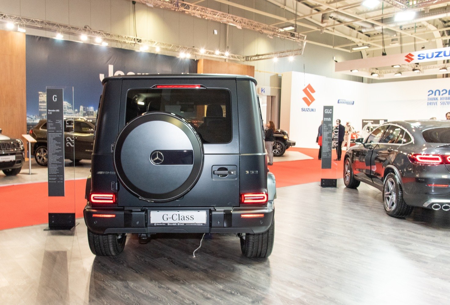 Rear view of SUV with spare wheel cover and LED tail lights