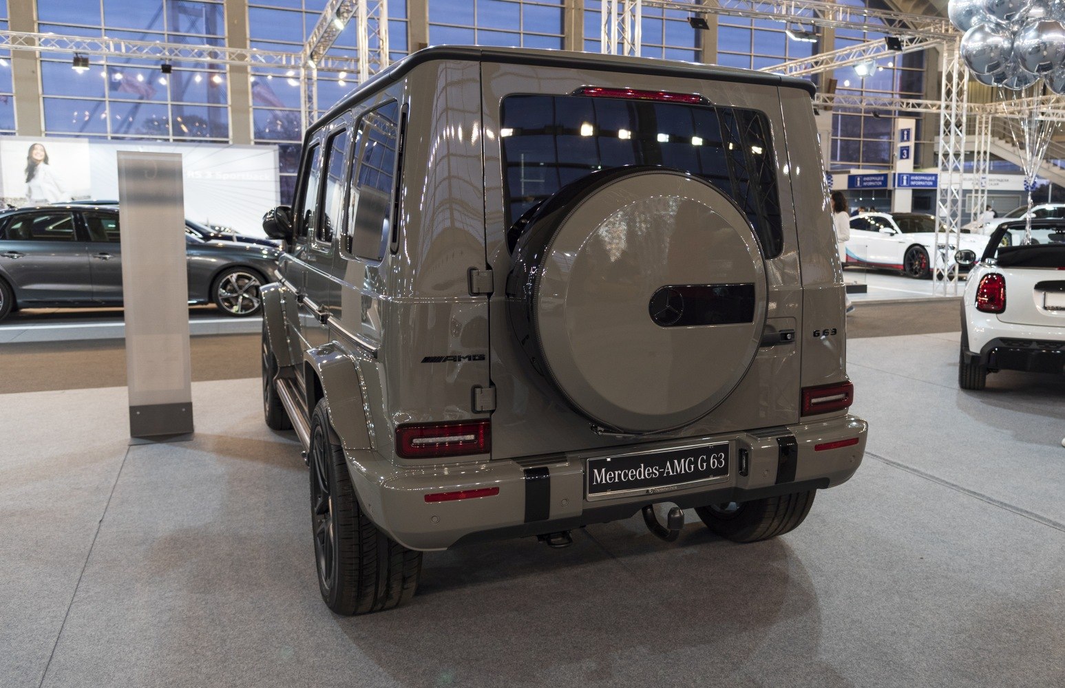 Rear view of luxury SUV with spare tire cover and modern taillights