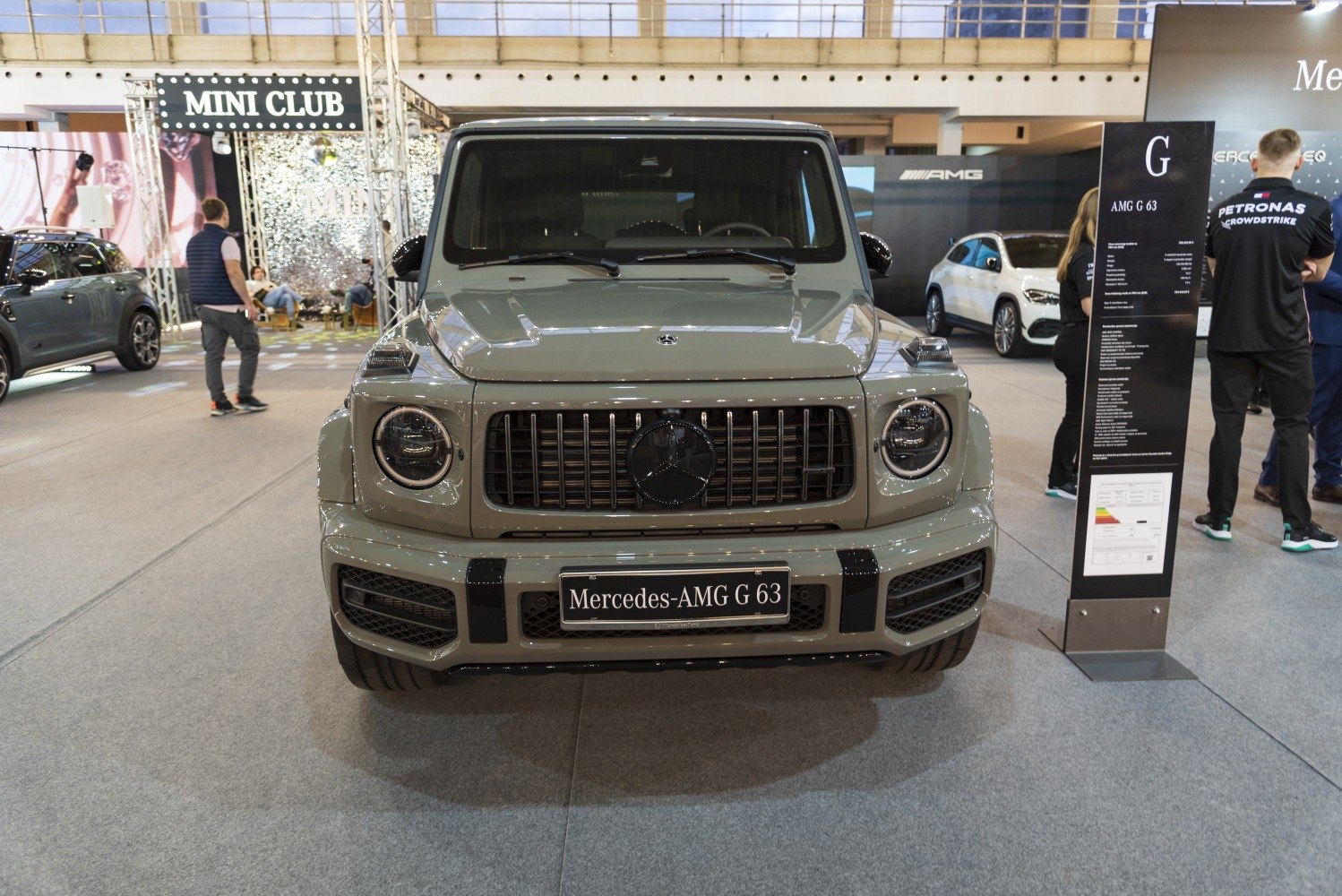 Front view of luxury SUV with distinctive AMG grille and round headlights