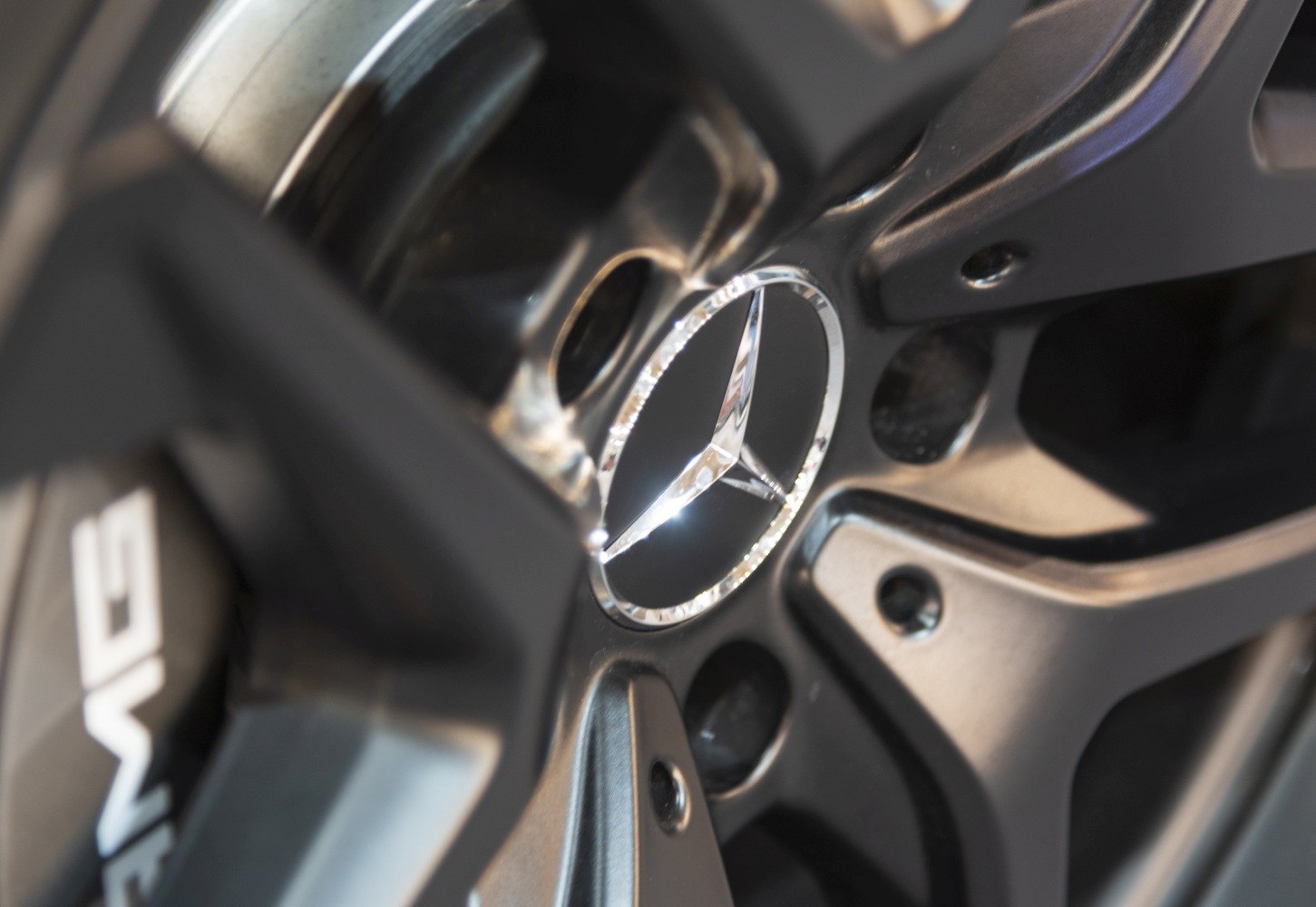 Close-up of AMG alloy wheel with Mercedes emblem