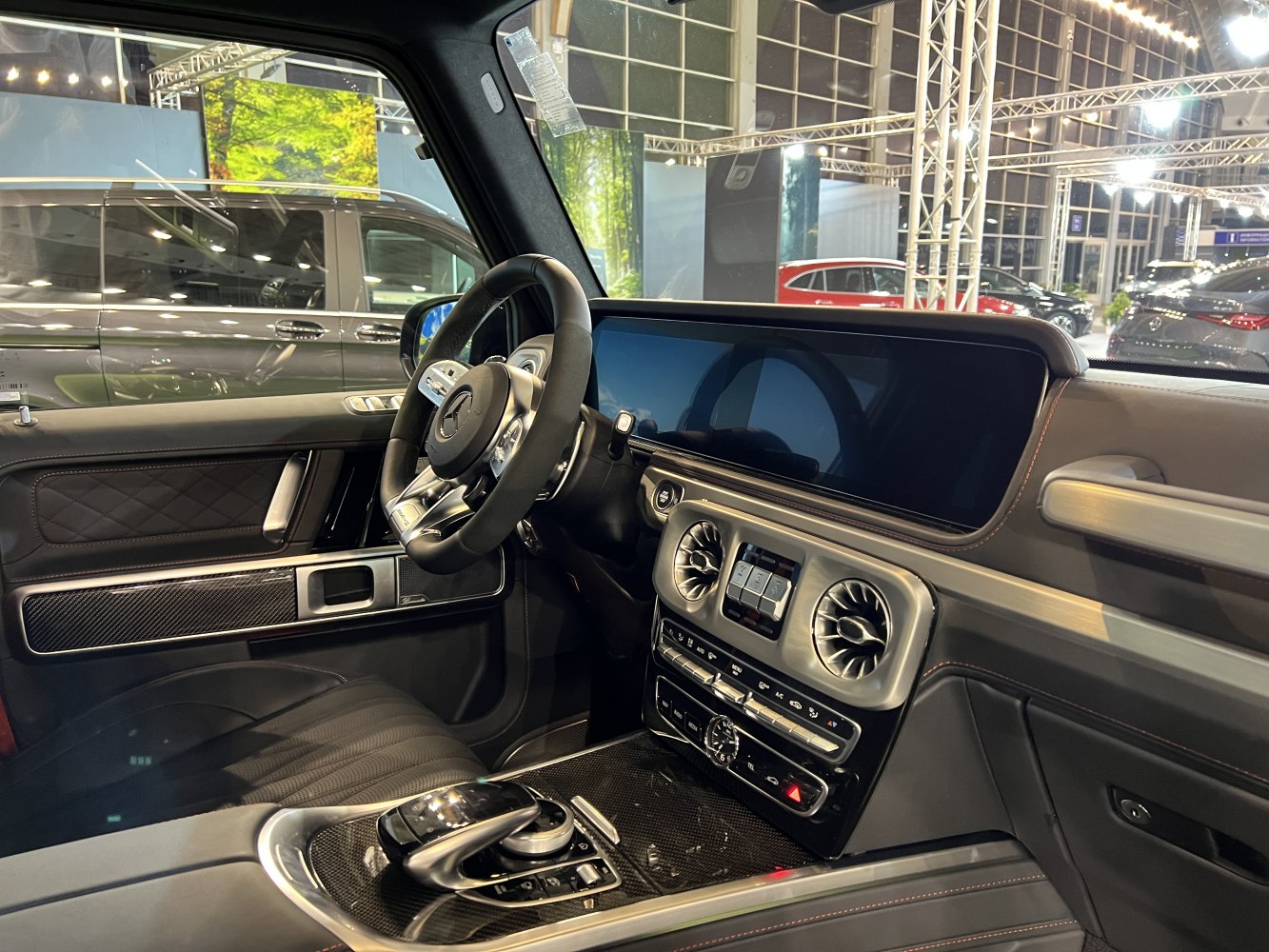 Luxury SUV interior with digital dashboard and steering wheel