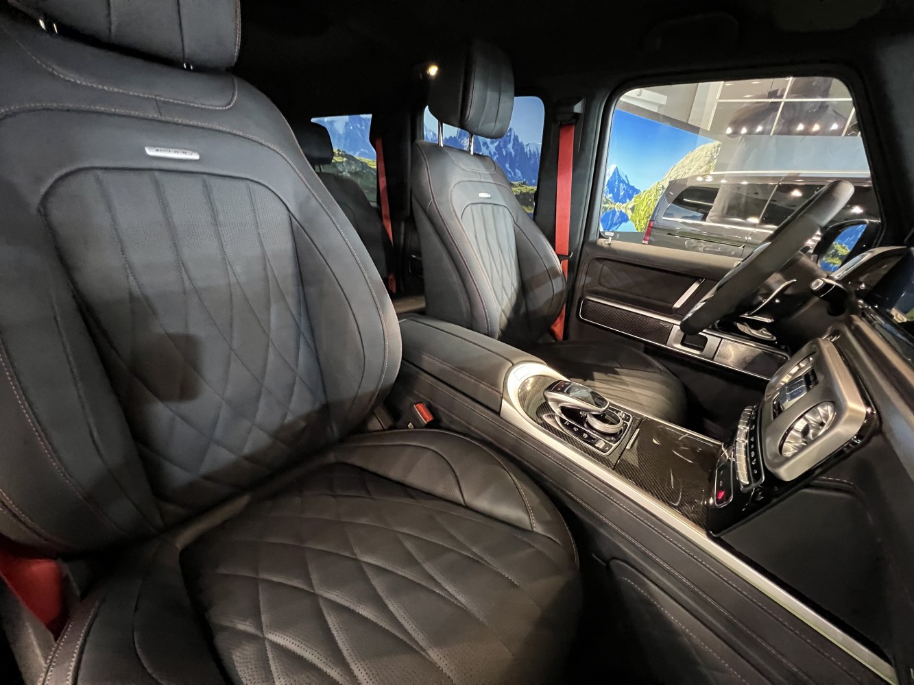 Luxury black leather seats with quilted stitching and advanced center console