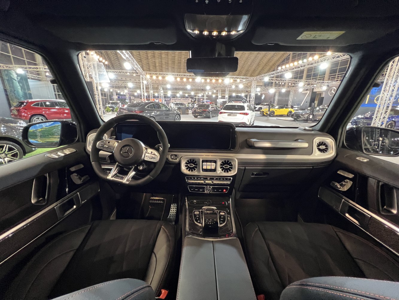 Luxury SUV interior featuring dashboard and steering wheel