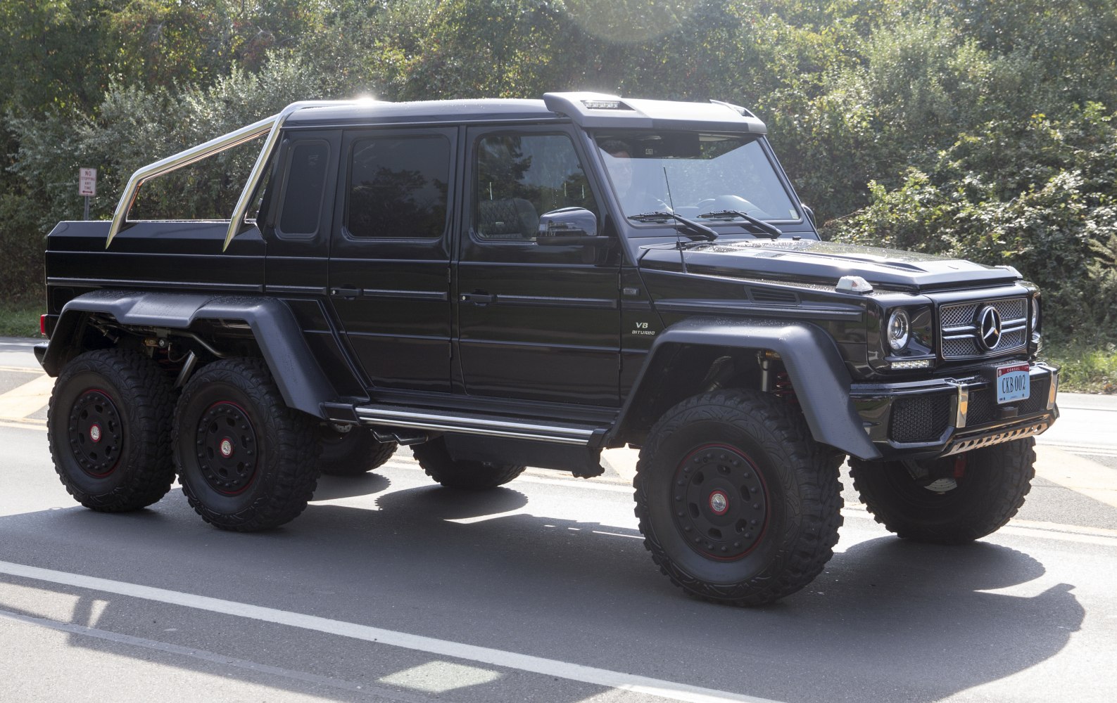 Six-wheel drive off-road SUV with V8 engine and rugged design